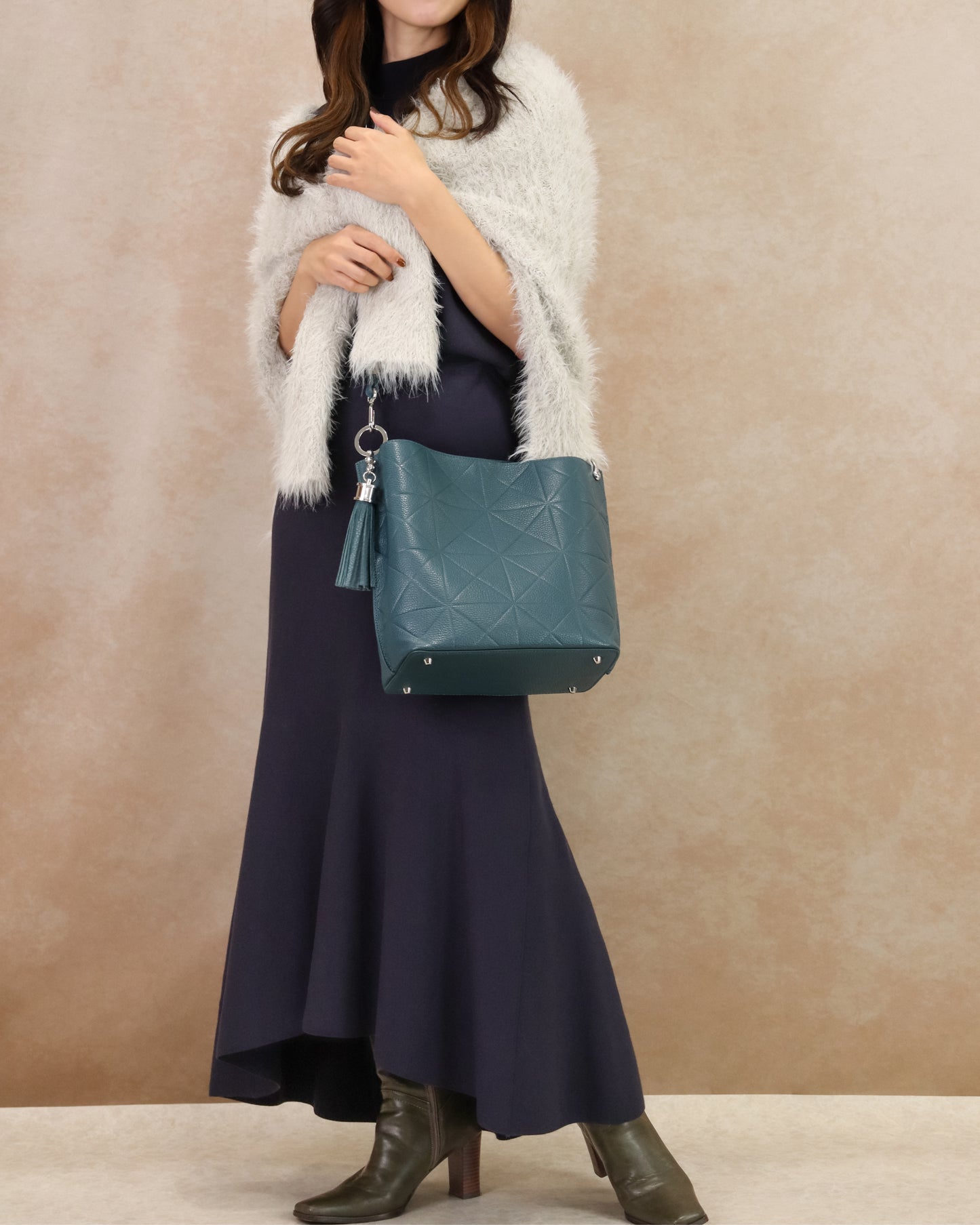 Synchro embossed cowhide bag