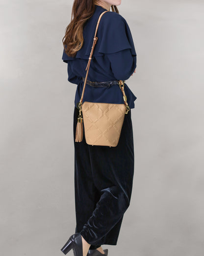 Cowhide compact shoulder bag